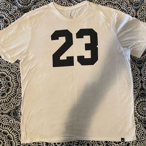 Jordan white shirt.